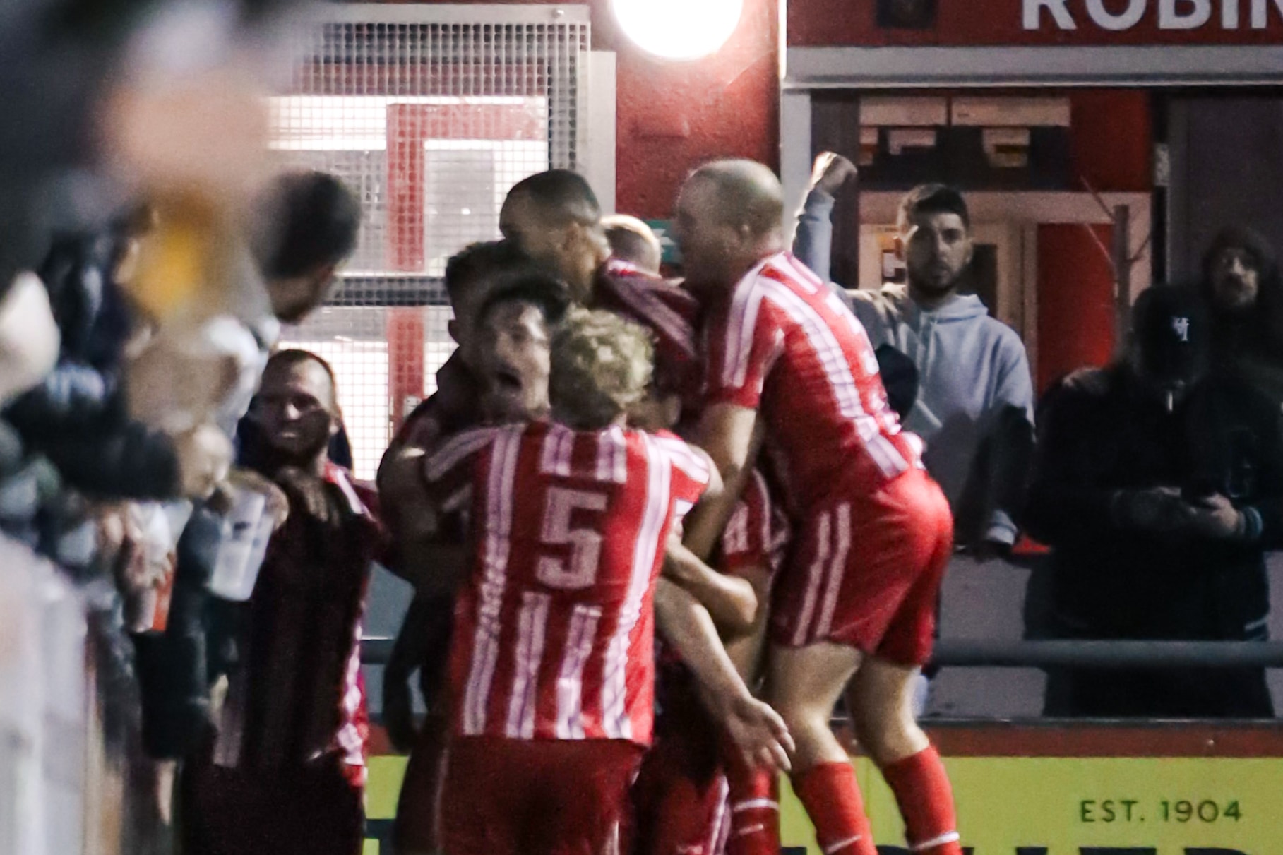 Bridgwater United players celebrate with fans at Fairfax Park against Clevedon Town